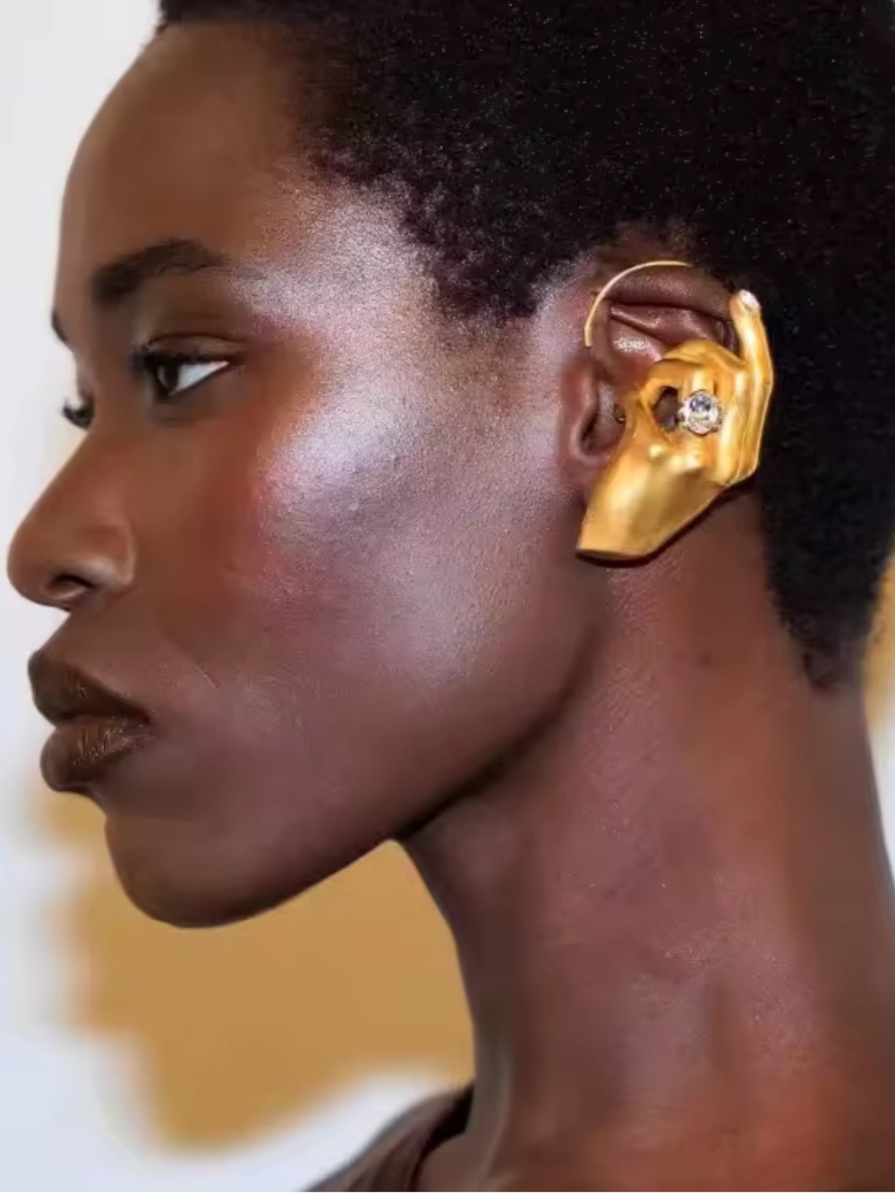 Anthropologie Gold Sculptural Hand Ear Cuff with Crystal